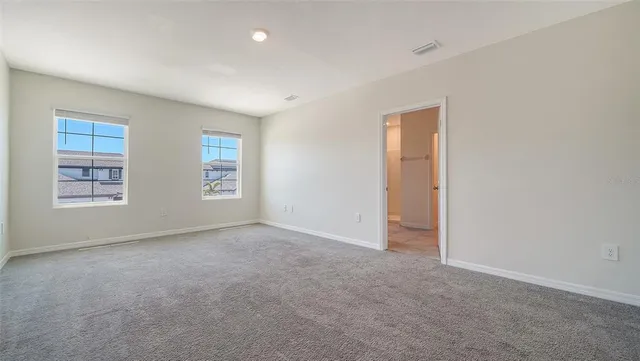 an empty room with windows