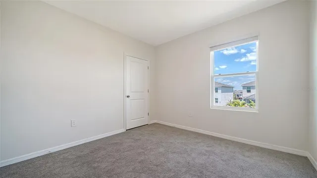 a view of a city street both side of house