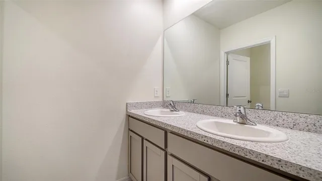 a front view of building with yard