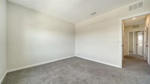 a view of swimming pool from a balcony