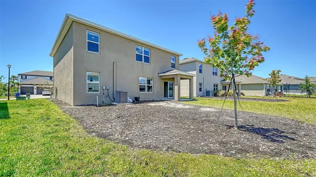 a view of a lake with a garden