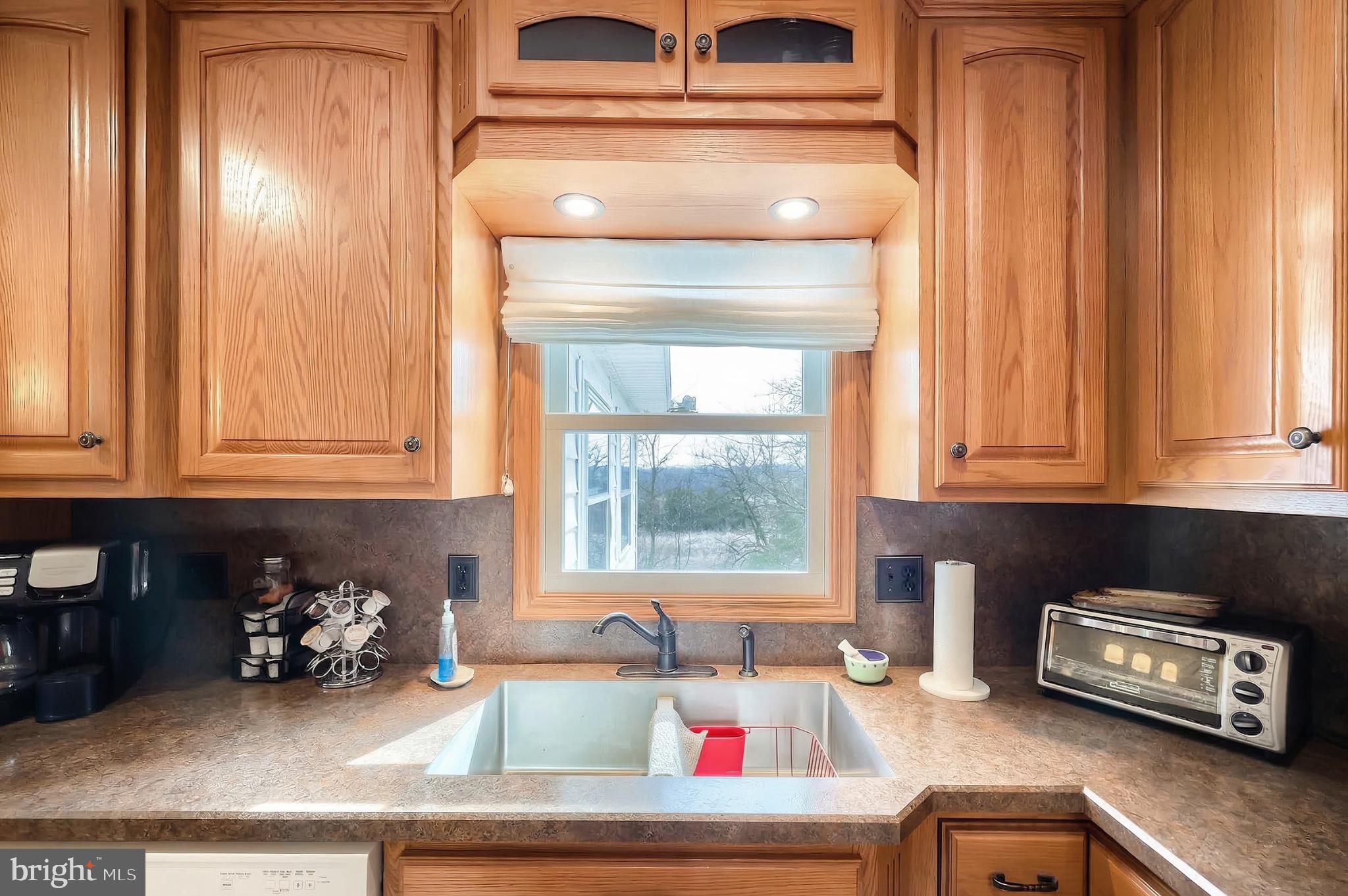 1766 Baltimore Road York Springs, PA 17372 - Photo 11 of 52 Warm wooden kitchen with bright window.