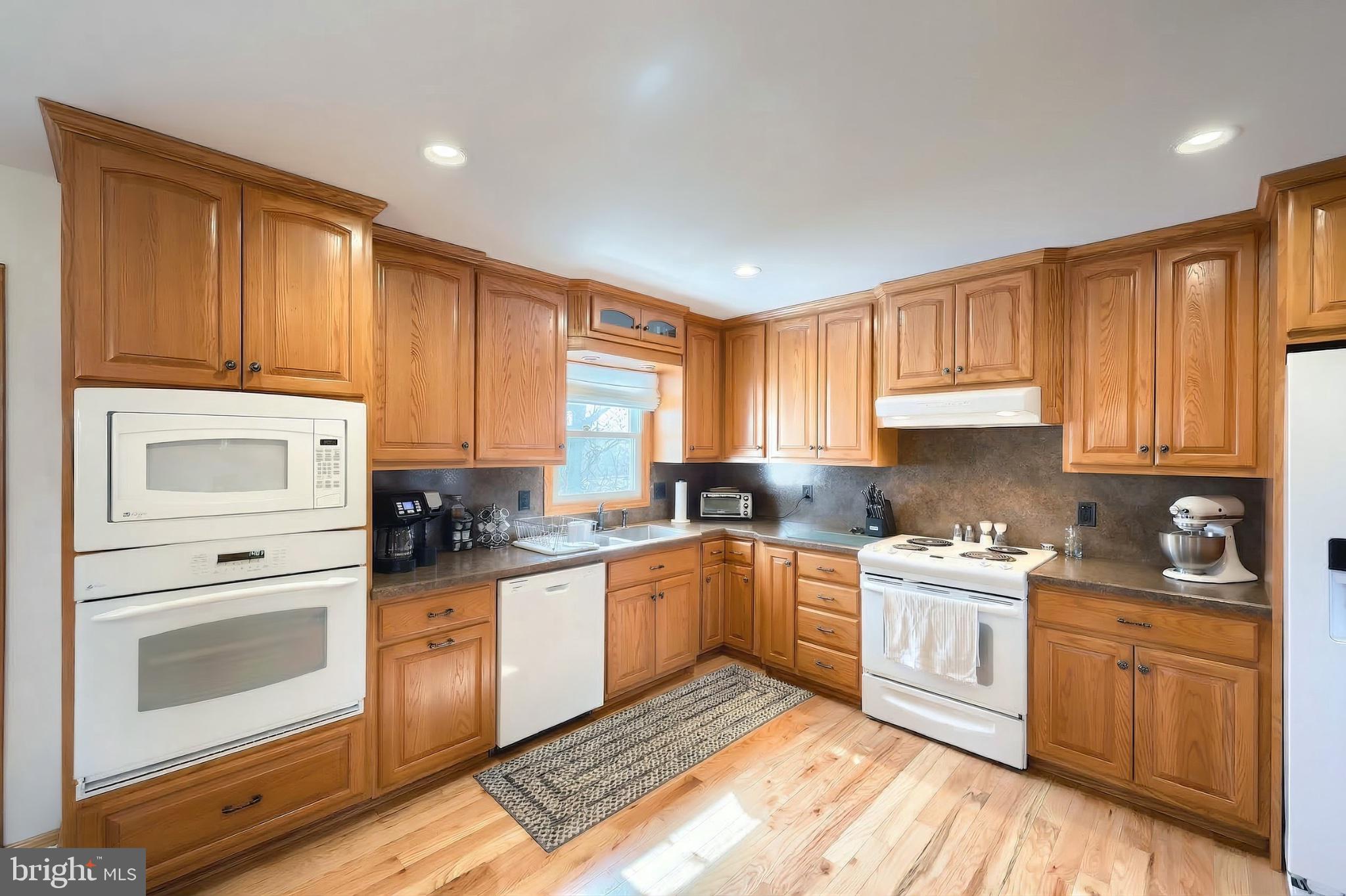 1766 Baltimore Road York Springs, PA 17372 - Photo 13 of 52 Warm wood tones in a cozy kitchen.