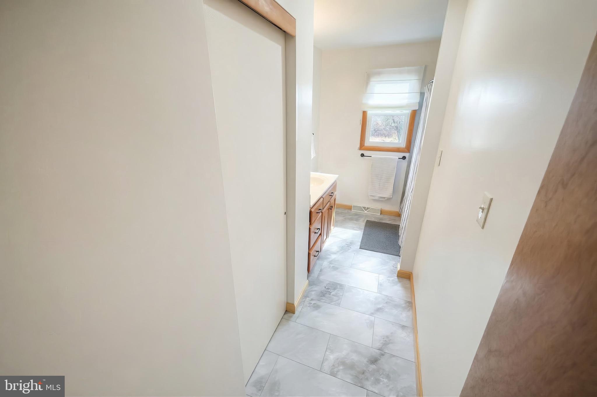 1766 Baltimore Road York Springs, PA 17372 - Photo 15 of 52 Bright and inviting bathroom hallway.