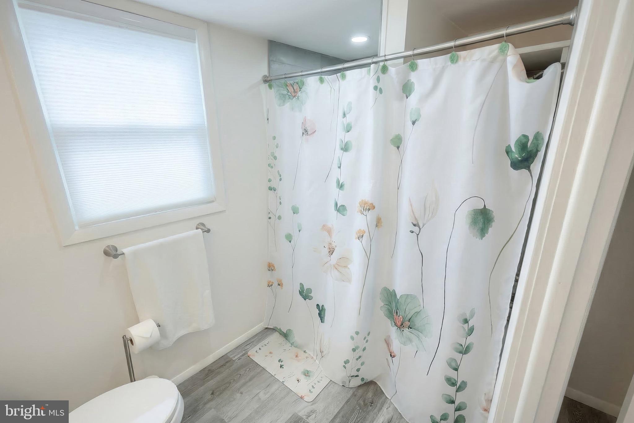 1766 Baltimore Road York Springs, PA 17372 - Photo 29 of 52 Serene bathroom with floral accents.