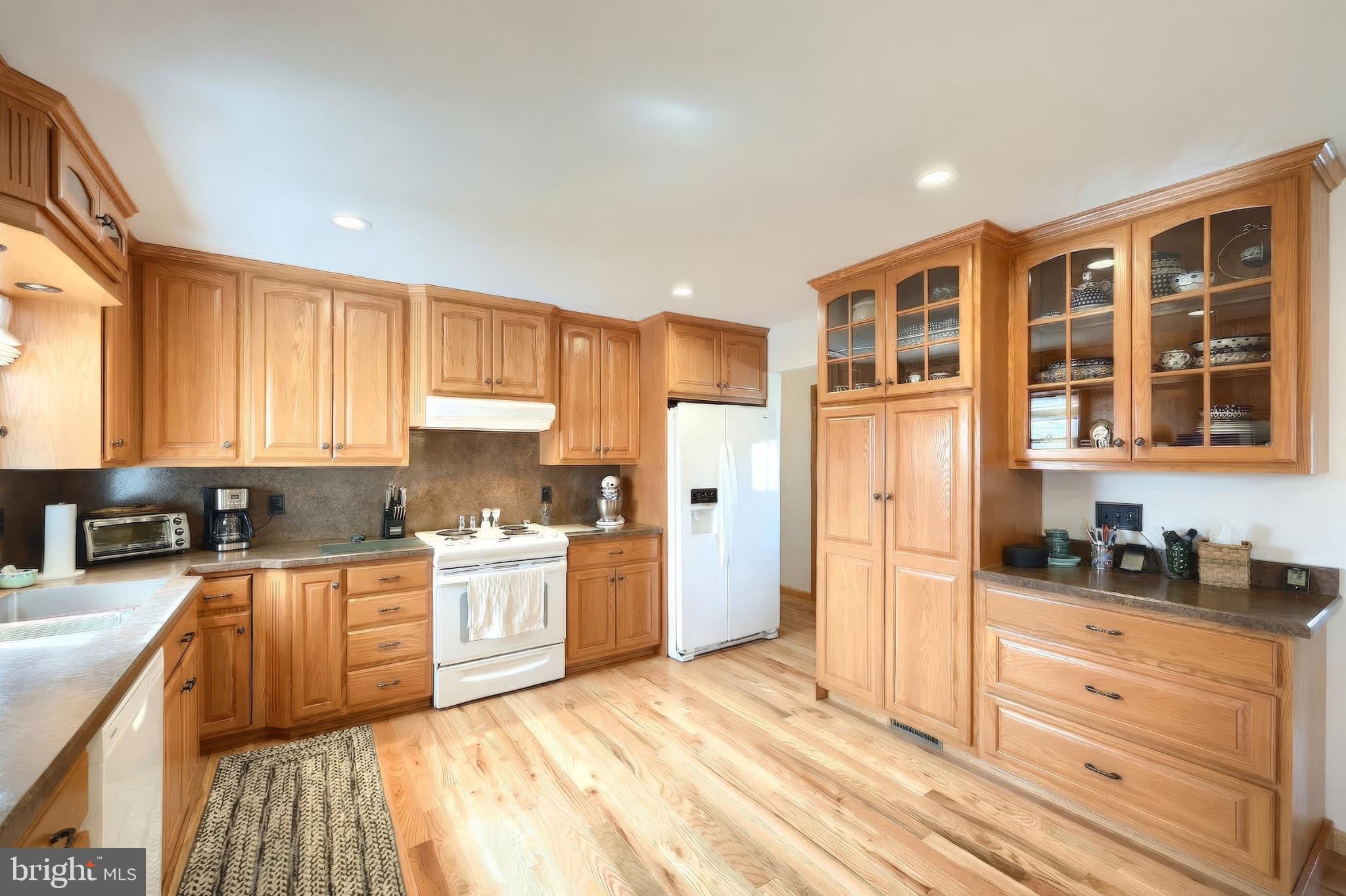 1766 Baltimore Road York Springs, PA 17372 - Photo 8 of 52 Warm wood tones in a cozy kitchen.