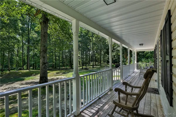 a view of a two chairs in the deck