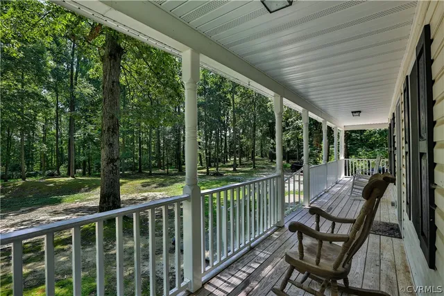 a view of a two chairs in the deck