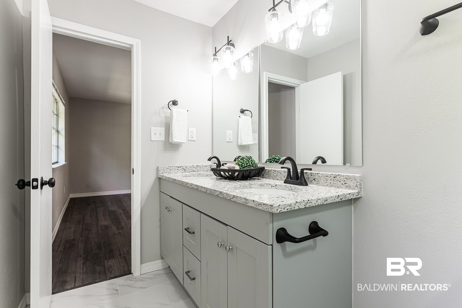 4626 Gold Drive Mobile, AL 36619 - Photo 27 of 48 Bathroom featuring vanity and hardwood / wood-style floors