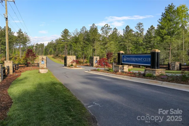 a view of a street with houses on both side