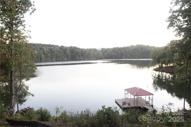 a view of lake with mountain