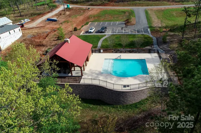 an aerial view of a house with a garden