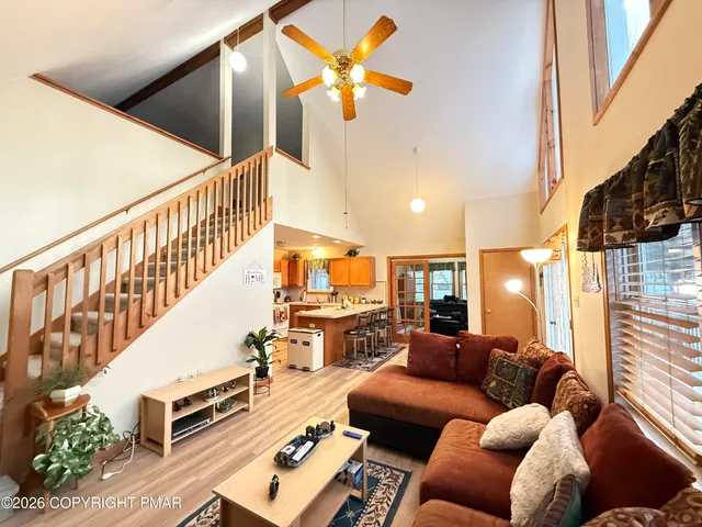 a view of a living room and front door