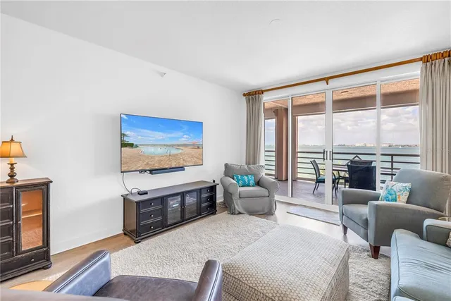 a bed room with a bed and a night stand