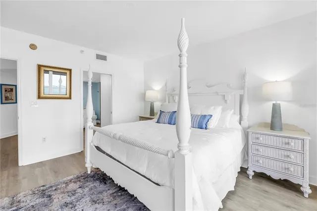 a view of a dining room with furniture and a window