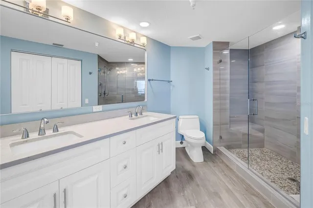 a view of a chairs and table in a balcony