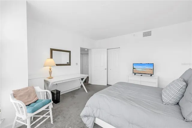 a view of a chairs and table on the patio