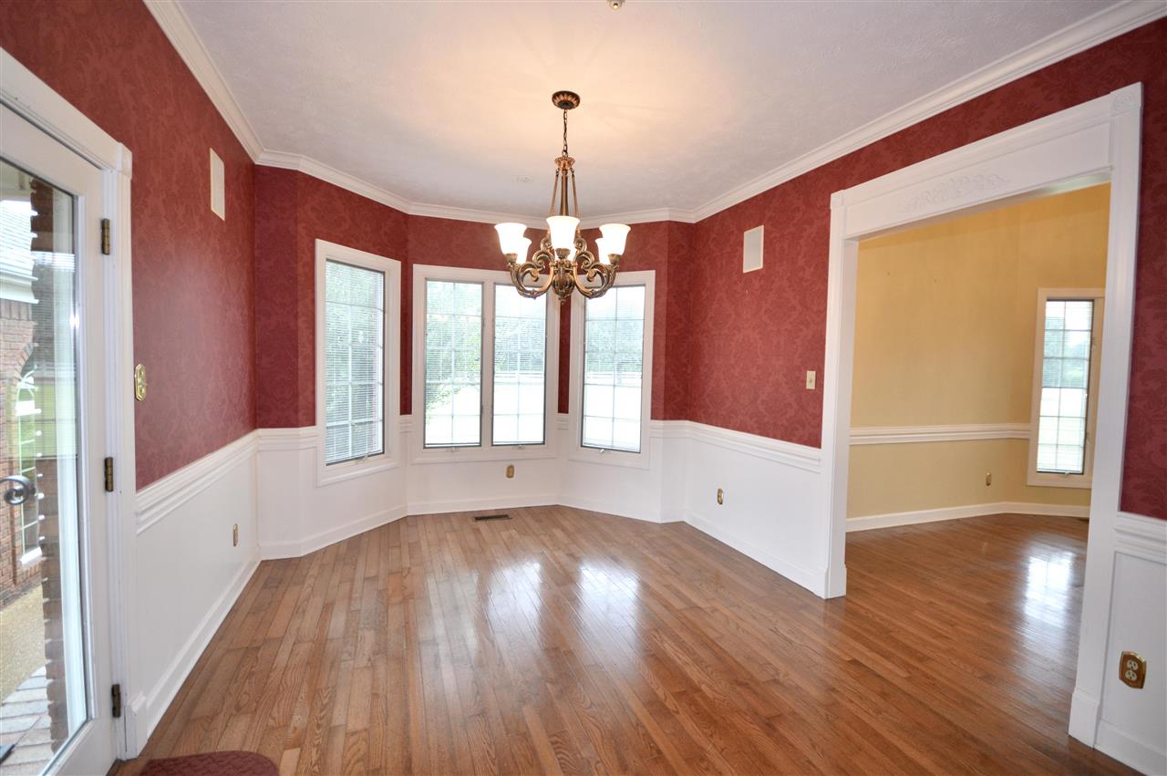 315 Hill House Road Toone, TN 38381 - Photo 16 of 23 a view of a room with wooden floors and windows