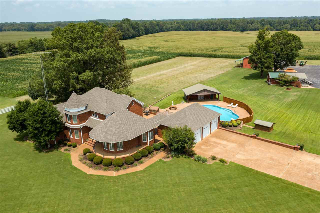 315 Hill House Road Toone, TN 38381 - Photo 4 of 23 an aerial view of a house with outdoor space and a lake view