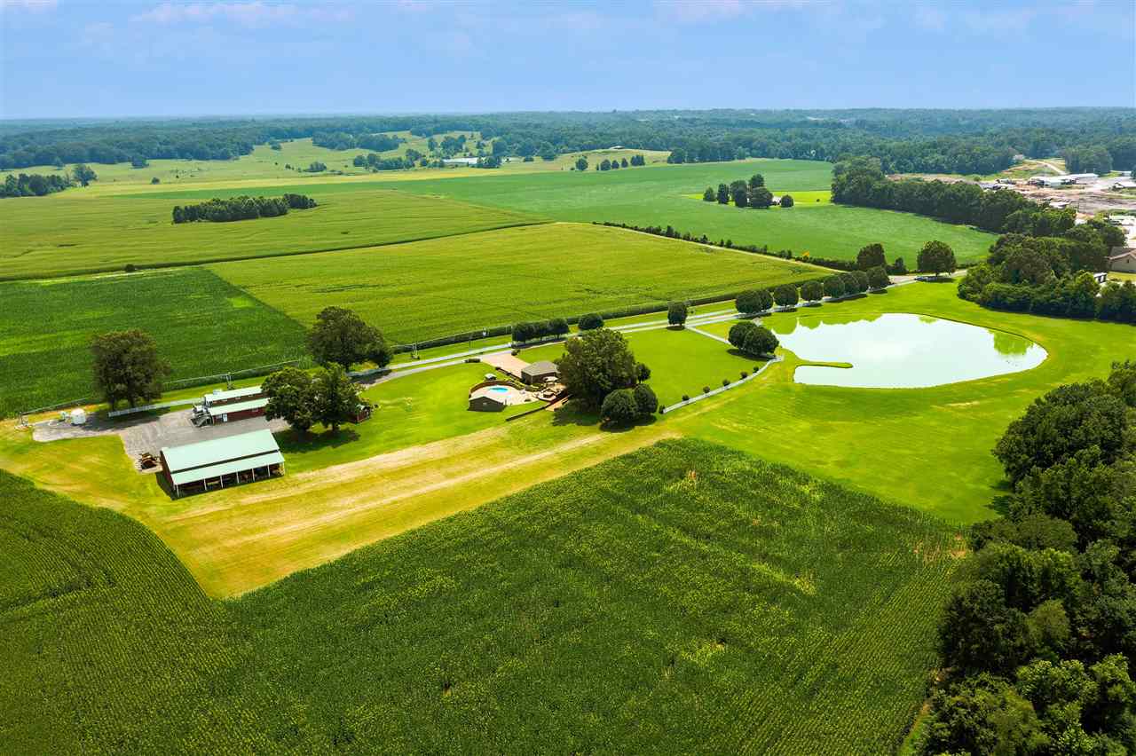 315 Hill House Road Toone, TN 38381 - Photo 5 of 23 an aerial view of a houses with outdoor space and trees all around