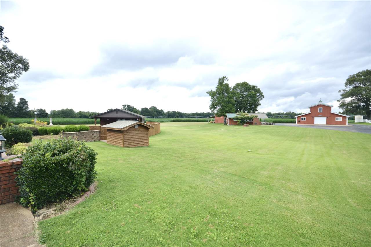 315 Hill House Road Toone, TN 38381 - Photo 6 of 23 a view of a lake with houses in the back