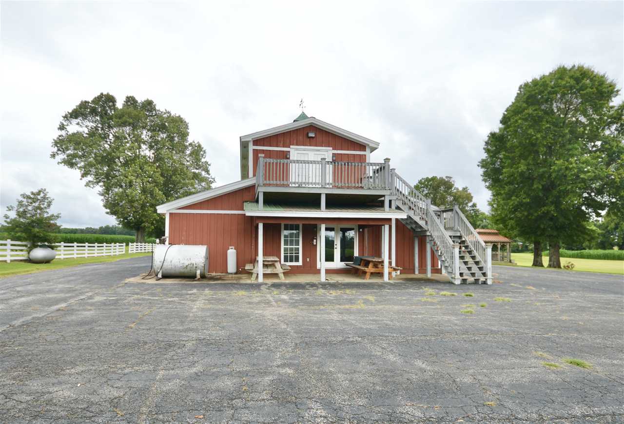 315 Hill House Road Toone, TN 38381 - Photo 10 of 23 a front view of a house with a yard