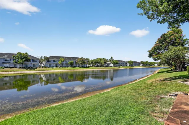 a view of a lake with a city