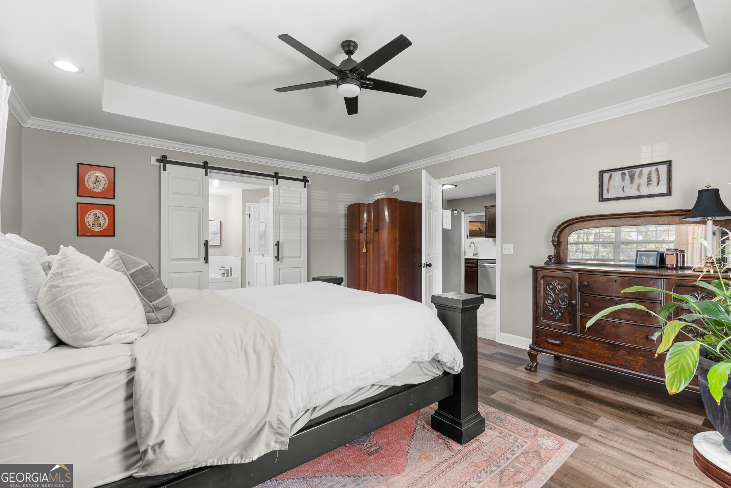 357 Pound Road Guyton, GA 31312 - Photo 17 of 49 a bedroom with a bed and a table