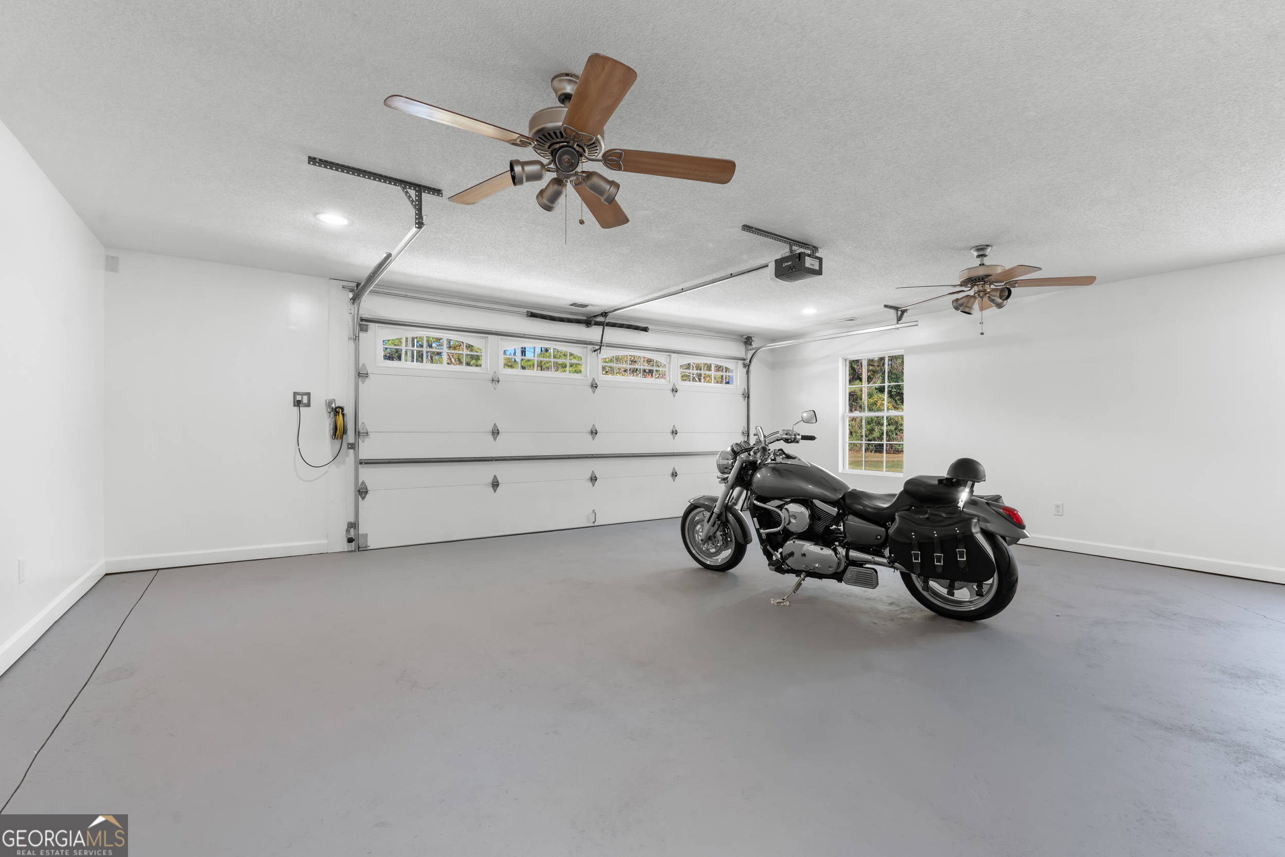 357 Pound Road Guyton, GA 31312 - Photo 26 of 49 a view of a garage with storage