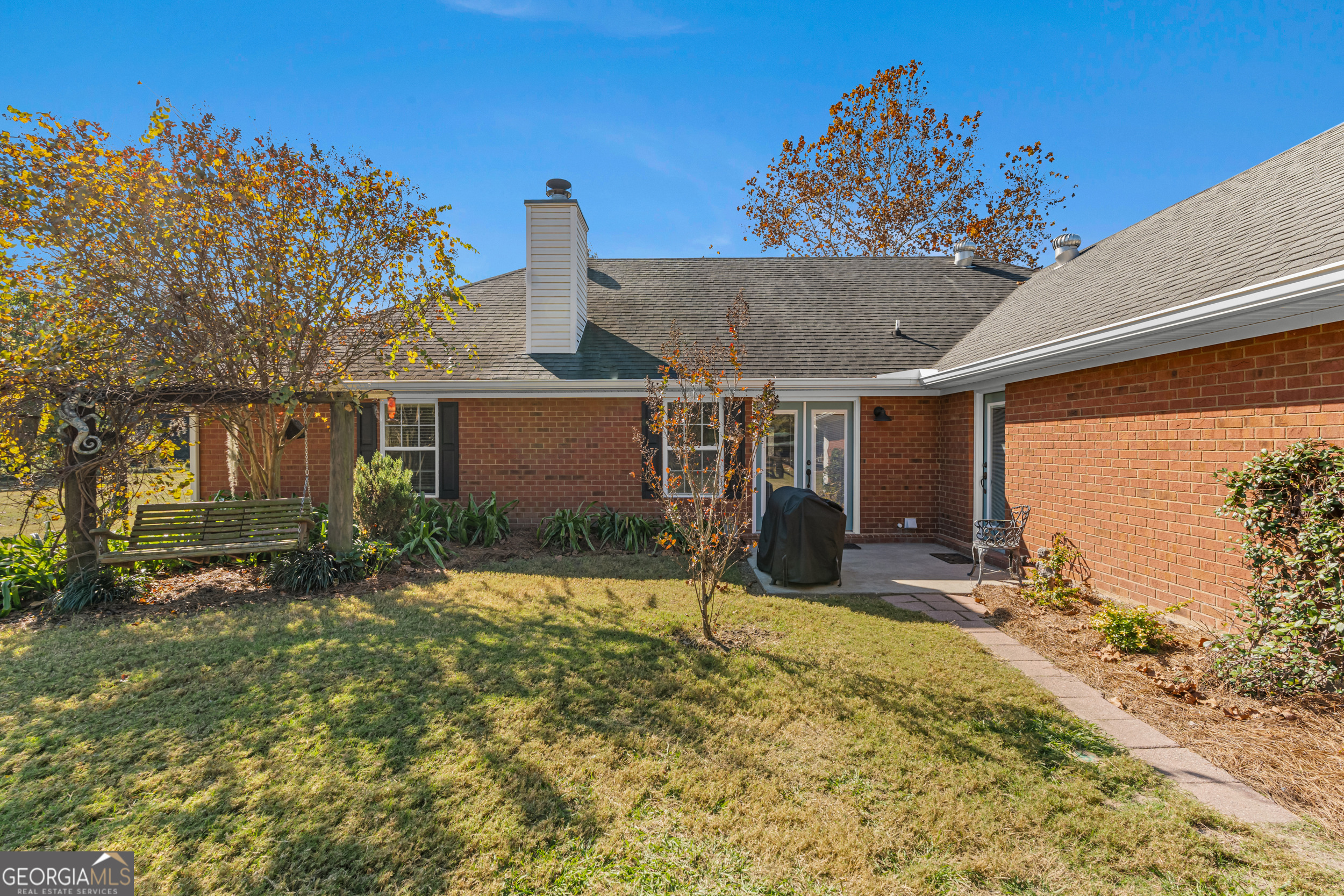 357 Pound Road Guyton, GA 31312 - Photo 27 of 49 a view of a house with a patio