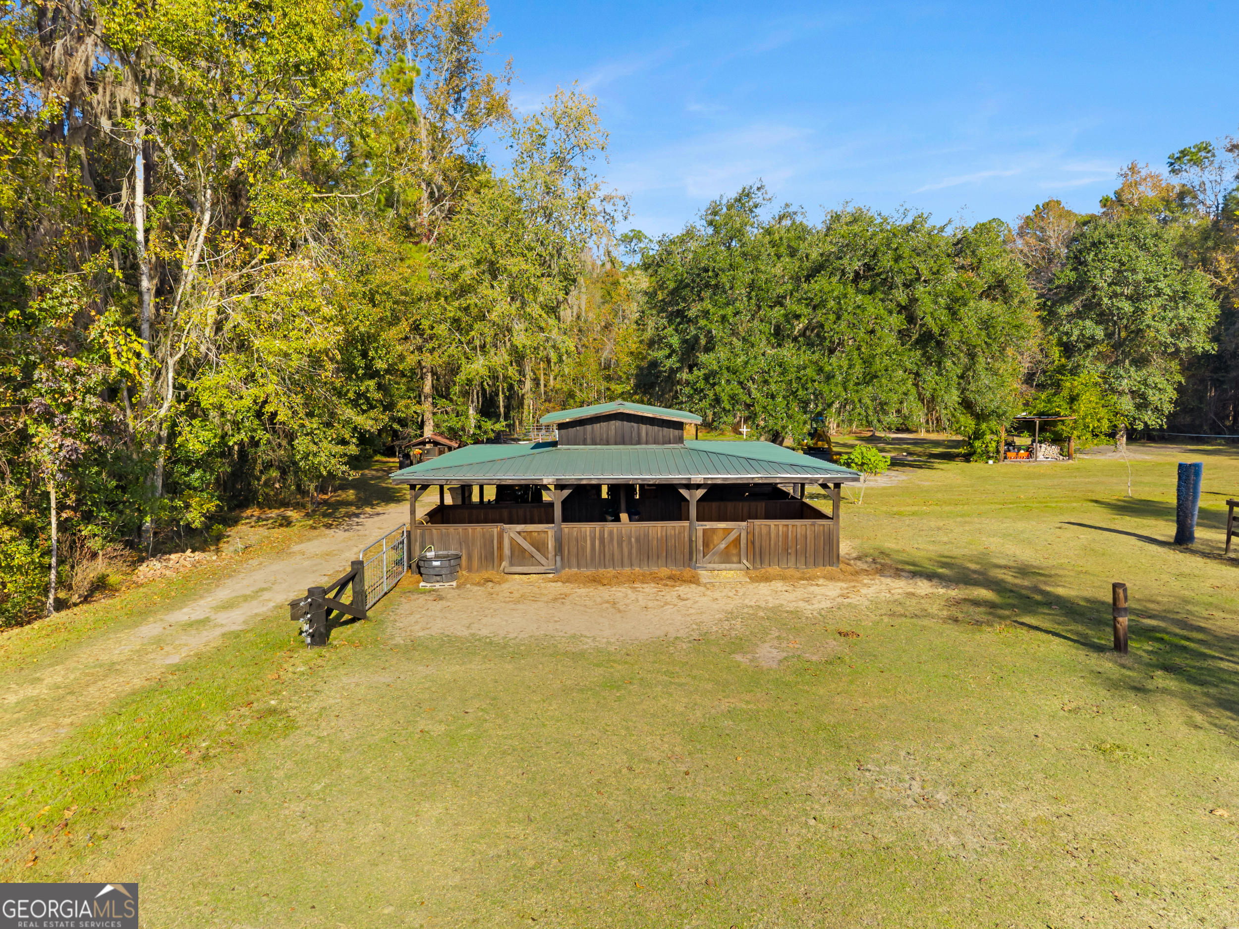 357 Pound Road Guyton, GA 31312 - Photo 31 of 49 a view of a swimming pool with a yard