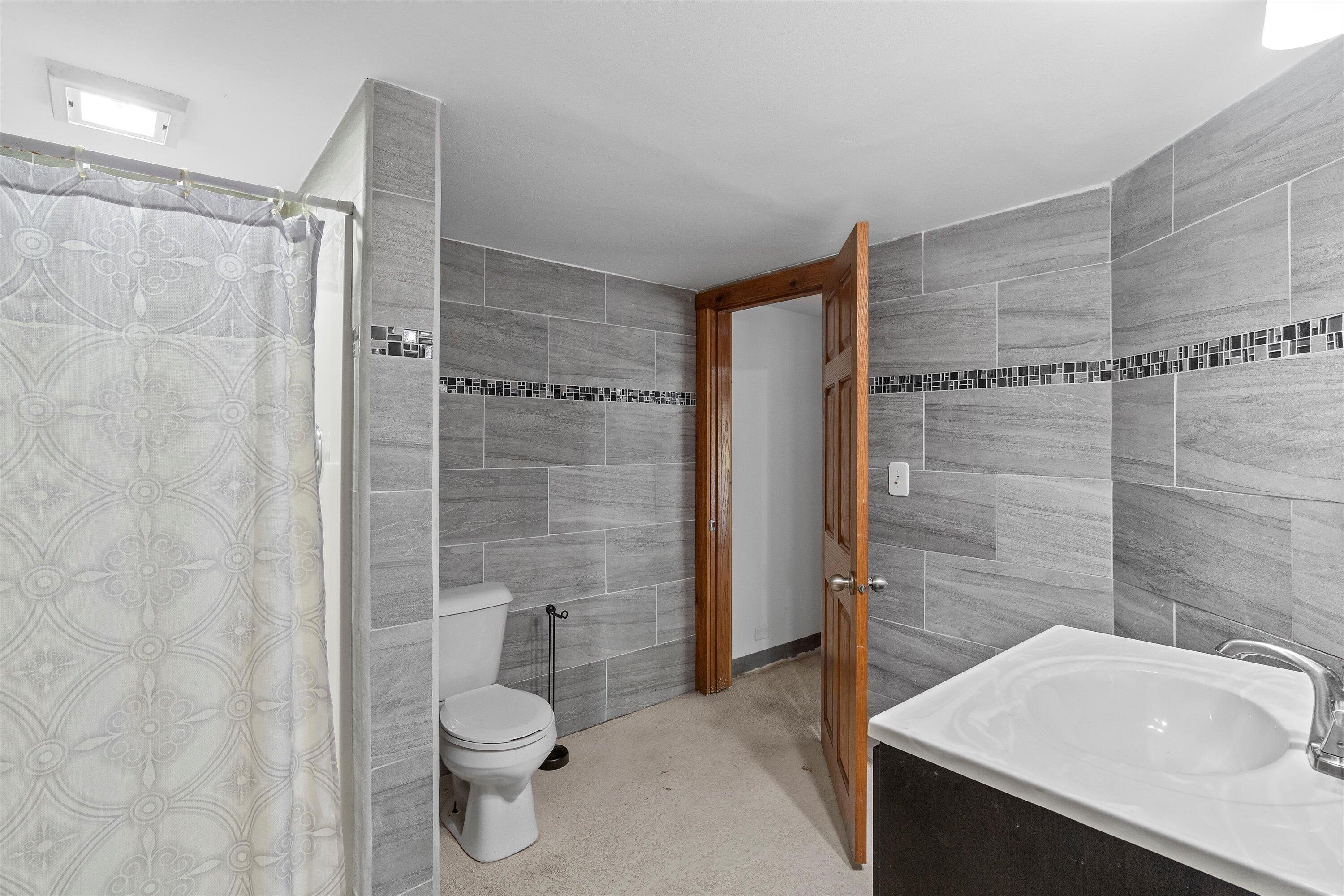 423 South Fancher Road Mount Pleasant, WI 53406 - Photo 31 of 69 REC ROOM BATHROOM