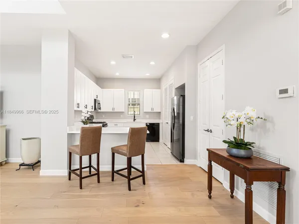 a view of a dining room with furniture