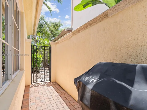a view of balcony with furniture