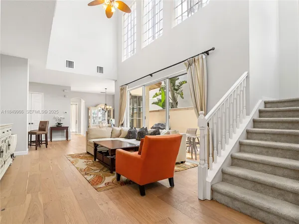 a living room with furniture and a table
