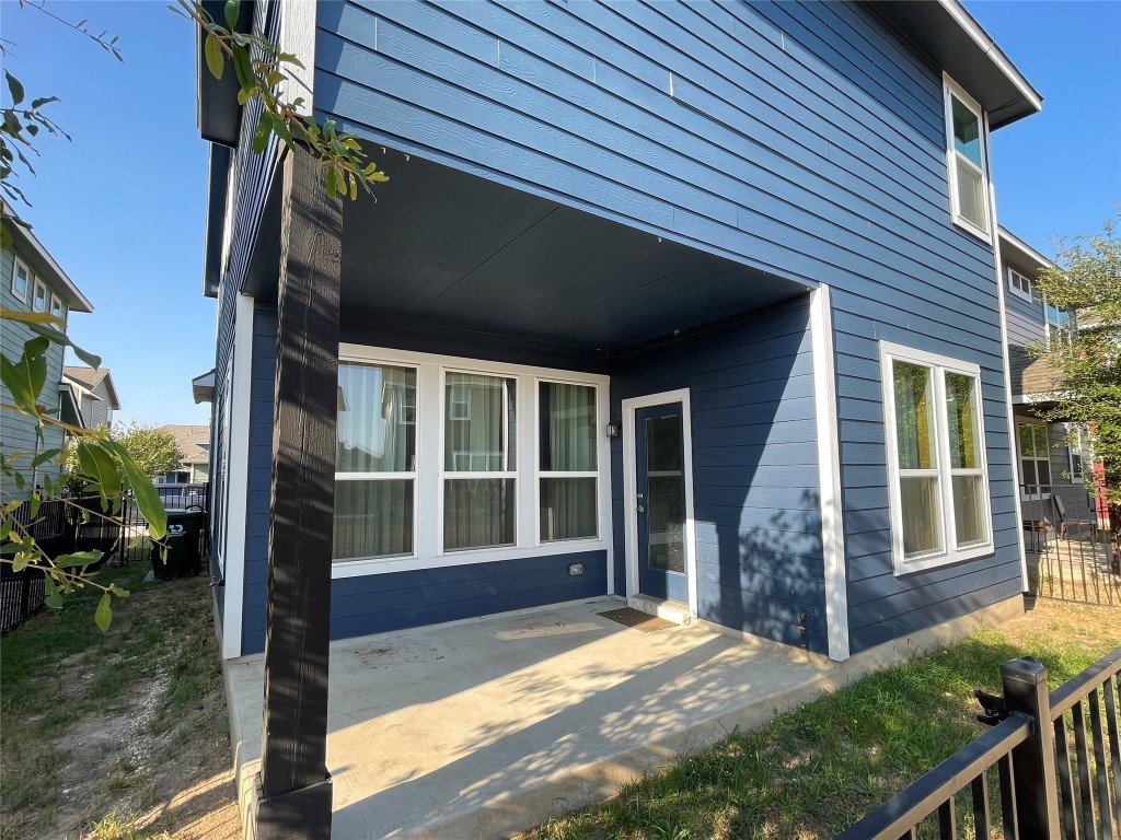 142 Simon Kyle, TX 78640 - Photo 15 of 16 a view of house with backyard and porch