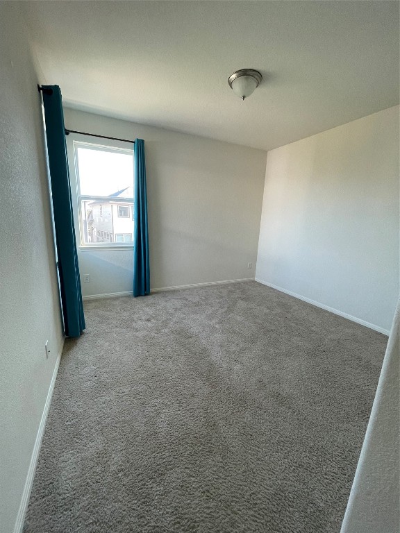 142 Simon Kyle, TX 78640 - Photo 9 of 16 an empty room with window