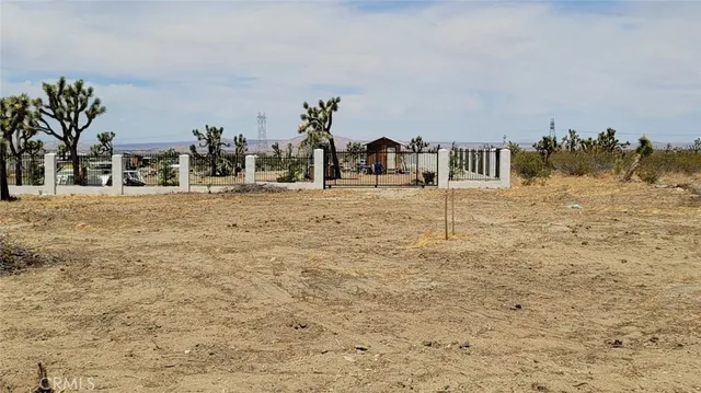 a view of a lake with mountains in the background