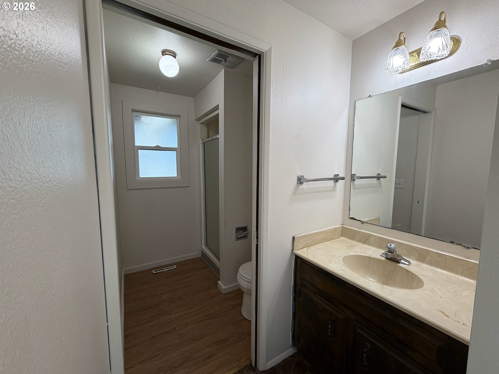 3328 Foxglove Street Lebanon, OR 97355 - Photo 13 of 16 a bathroom with a sink and a mirror
