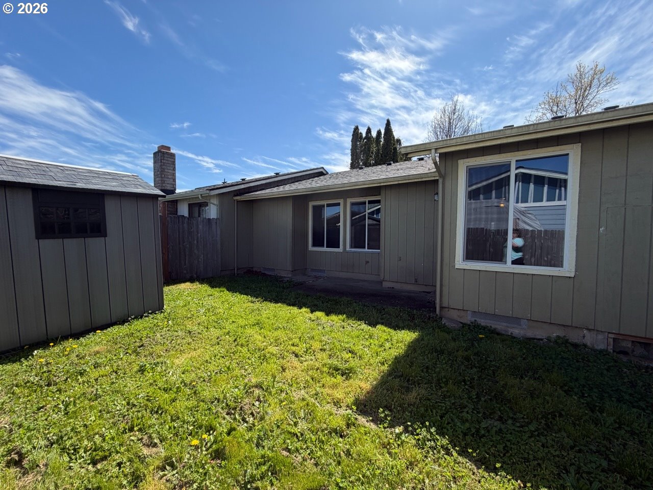 3328 Foxglove Street Lebanon, OR 97355 - Photo 15 of 16 a house view with a garden space