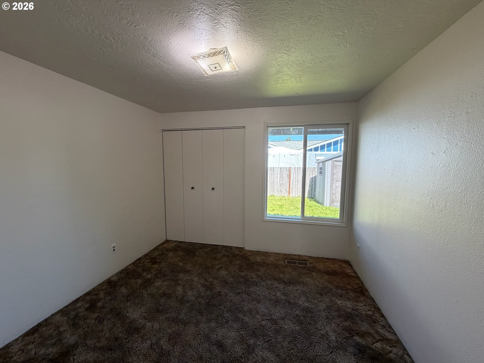 3328 Foxglove Street Lebanon, OR 97355 - Photo 7 of 16 an empty room with windows