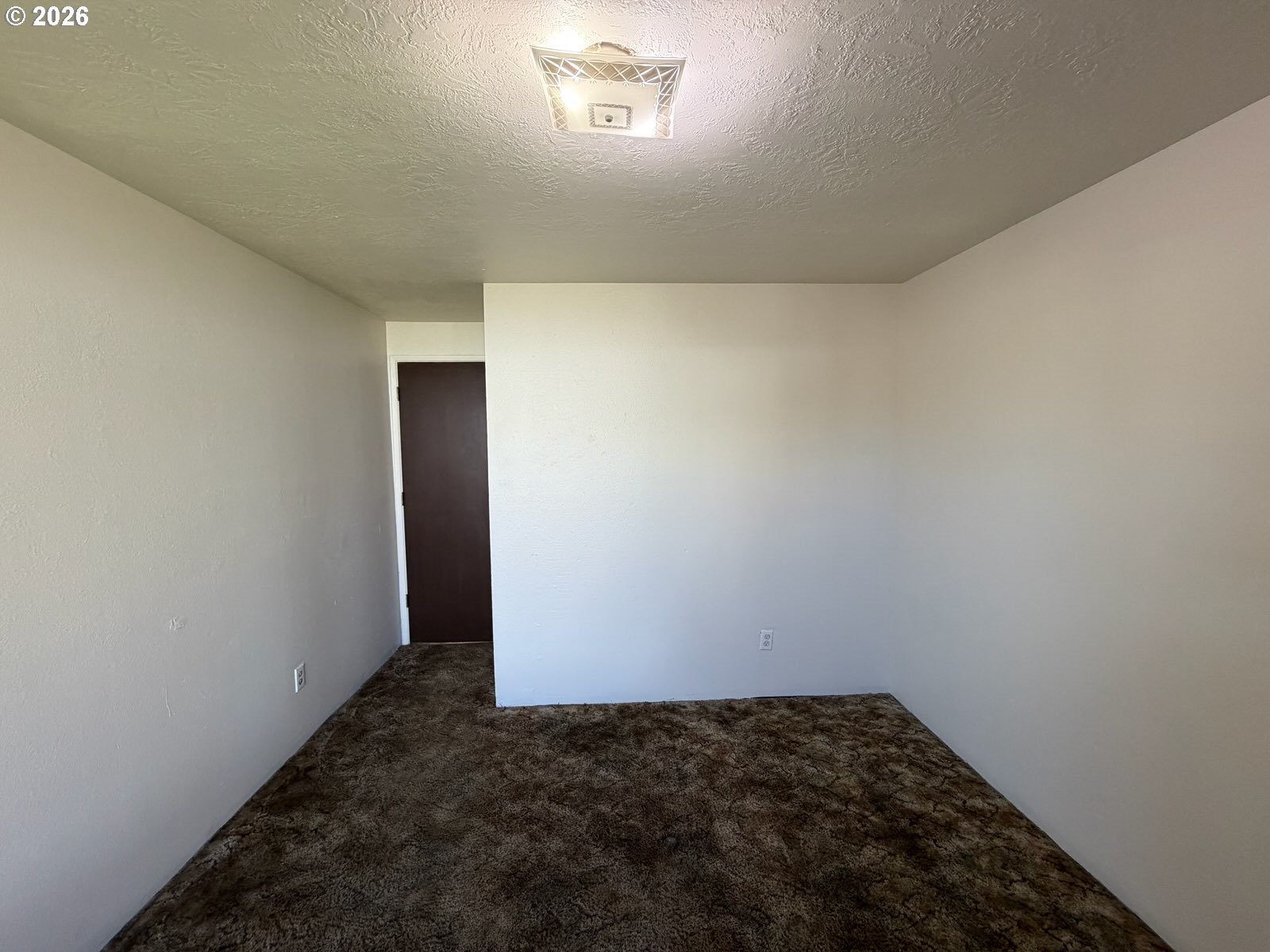 3328 Foxglove Street Lebanon, OR 97355 - Photo 8 of 16 a view of a hallway with a window