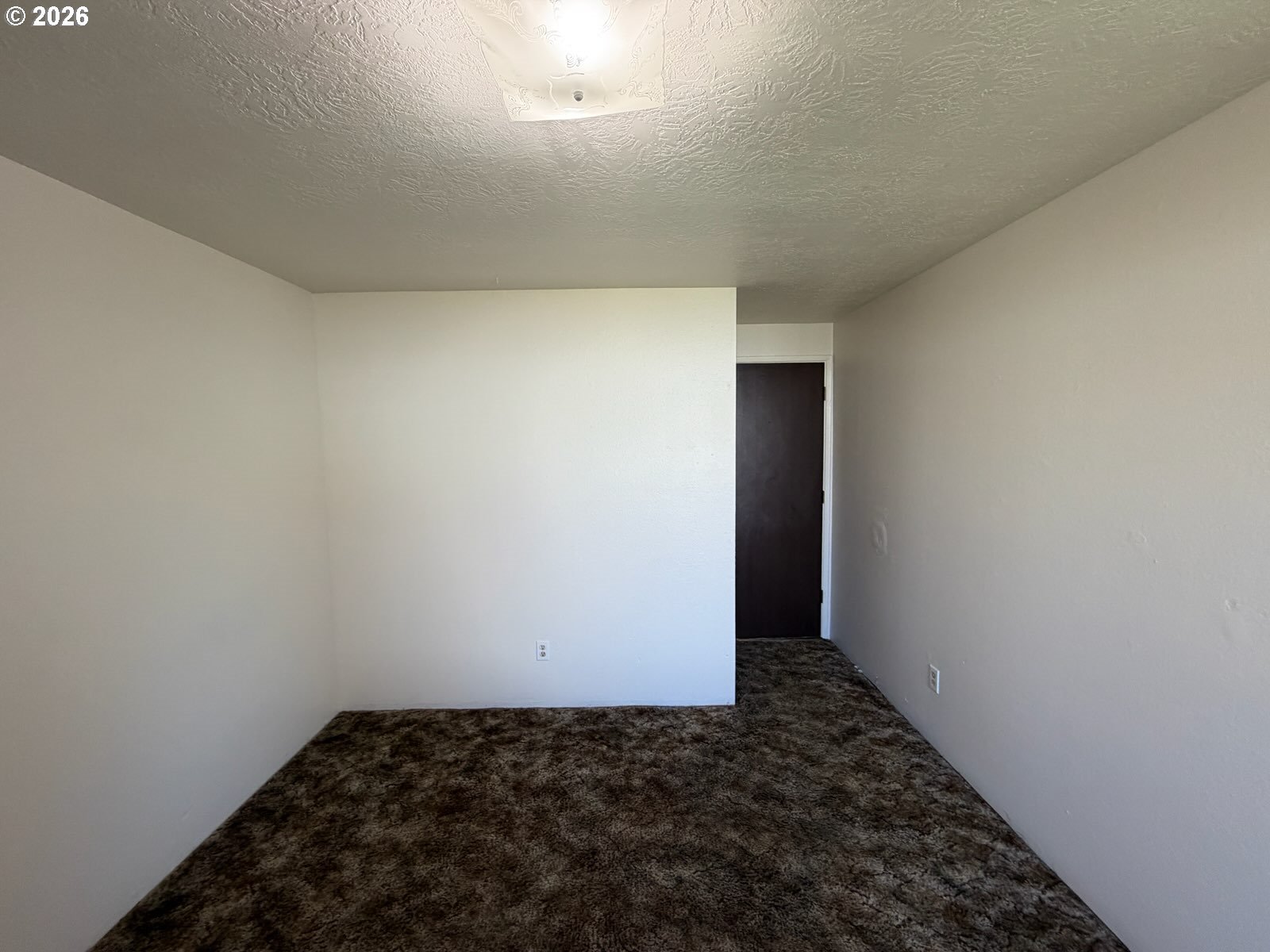 3328 Foxglove Street Lebanon, OR 97355 - Photo 10 of 16 a view of an empty room
