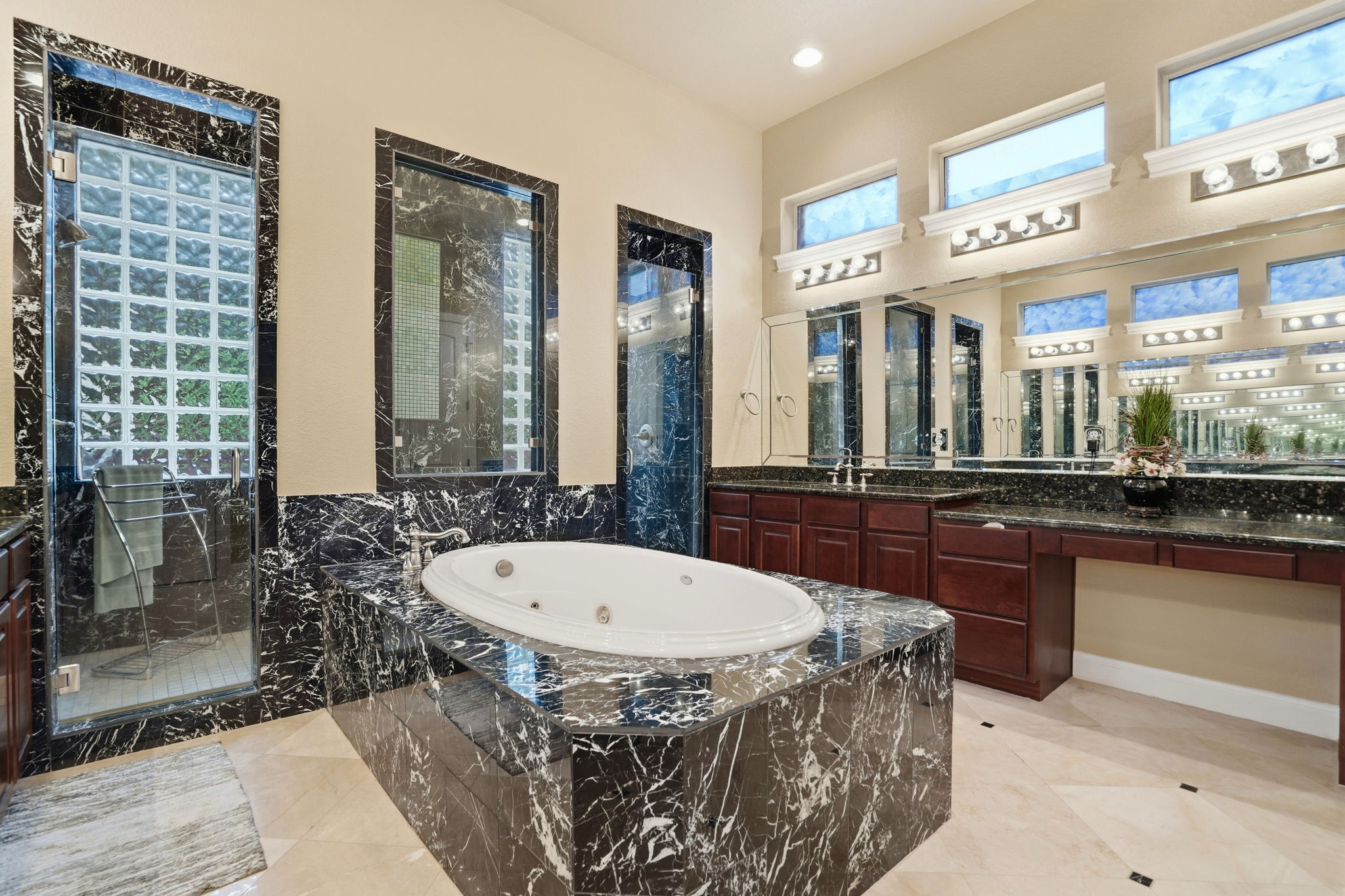 222 Vailco Lane Austin, TX 78738 - Photo 33 of 39 Soaking tub set within a dark veined stone surround