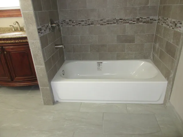 a close view of a bathtub in bathroom