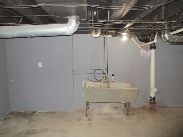 a view of a room with racks on the wall