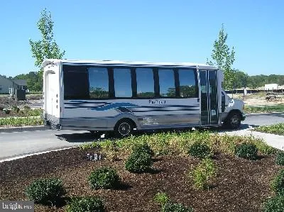 a view of a patio with a yard