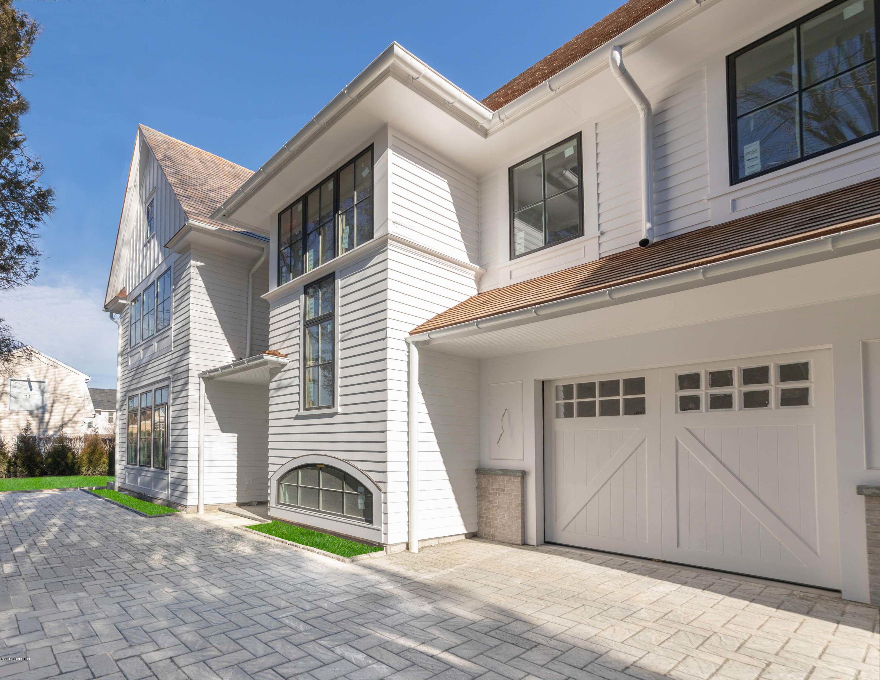 59 East Elm Street, Unit BACK Greenwich, CT 06830 - Photo 14 of 18 a view of a house with a garage