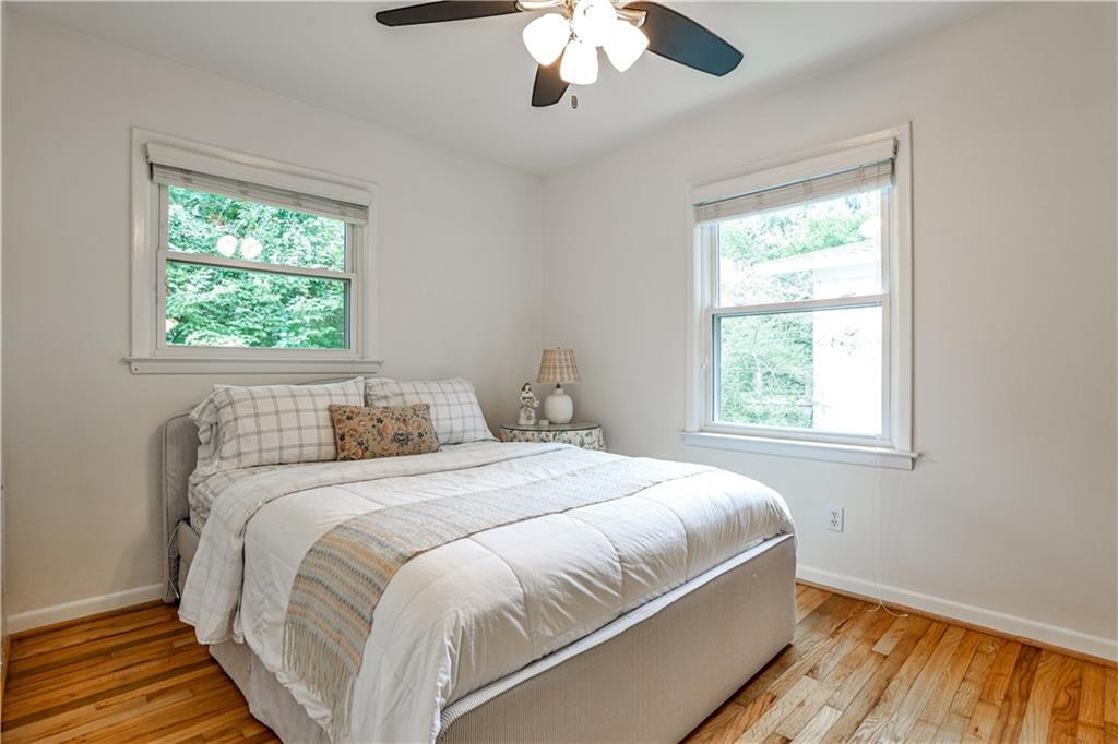 1010 Greenbriar Circle Decatur, GA 30033 - Photo 12 of 28 a bedroom with a large bed and a window