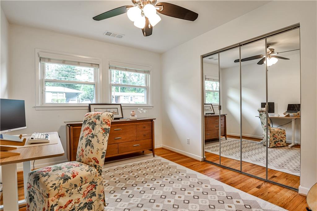 1010 Greenbriar Circle Decatur, GA 30033 - Photo 13 of 28 a bed room with a bed and a television